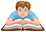 Boy reading book. Child sits in front of an open book