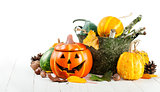 Holiday Halloween autumn decoration with jack-o-lantern pumpkins