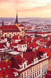 Top view to red roofs skyline of Prague city