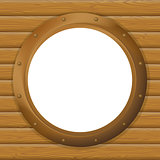 Window porthole in a wooden wall