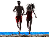 couple walking running on the beach