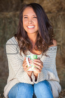 Asian Eurasian Girl Woman on Hay Bale Drinking Coffee Tea
