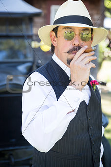 1920s Dressed Man Near Vintage Car Smoking Cigar