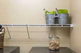 Laundry Room with Buckets and Jar of Clothes Pins