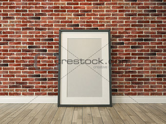 picture frame on the brick wall and wood floor
