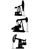 Three oil pumps silhouettes