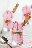 Cups of pink ice cream