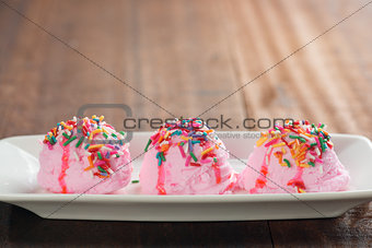 Colorful decor pink ice cream with copy space on top