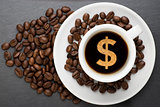 Cup of coffee with dollar