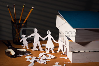 Desk with family in paper in night