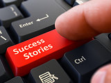 Press Button Success Stories on Black Keyboard.