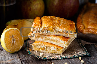 Homemade pie stuffed with apples and lemon