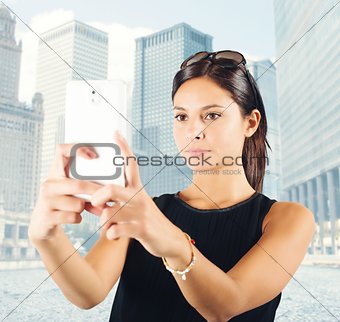 Woman photographs the city