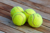 Four tennis balls 