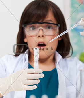 Young boy doing a chemical experiment