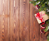 Christmas background with fir tree and gift box