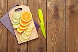Sliced citruses on cutting board
