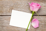 Valentines day greeting card or photo frame and pink rose