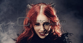 devil girl smiling