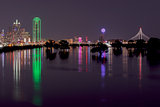 Skyline of Dallas, Texas at Night across Flooded Trinity River