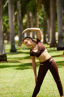 Woman Doing Stretching Before Sport Training At Morning-4