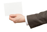 Businessman holding small blank card