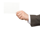 Businessman holding small blank paper