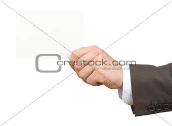 Businessman holding small blank paper