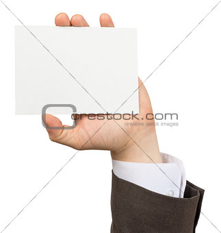 Businessman holding small empty card