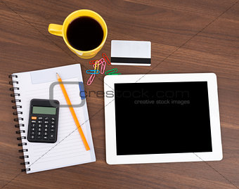 Blank copybook with tablet and calculator