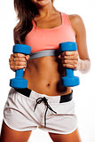young pretty slim woman with dumbbell isolated