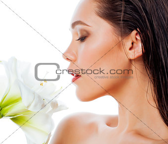 young pretty woman with  Amarilis flower close up isolated on white