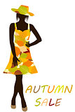 Autumn background with fashion woman with dress made of leaves