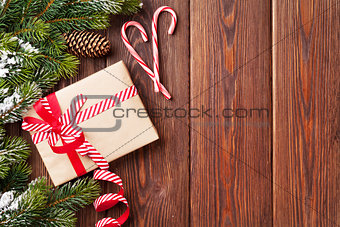 Christmas background with fir tree and gift box