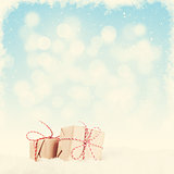 Christmas gift boxes in snow