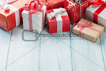 Christmas gift boxes on wooden table