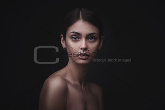 Beautiful face of young adult woman with clean fresh skin