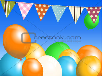 Balloons and bunting over blue sky