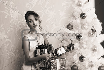fashion girl with christmas presents in BW