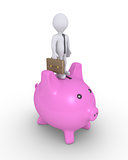 Pig money box and businessman on top