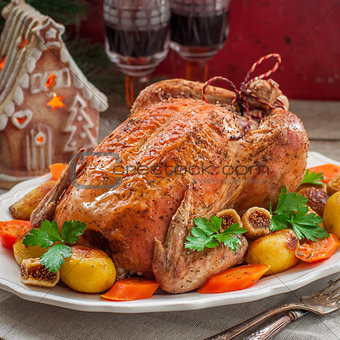Christmas Stuffed Chicken Served with Potatoes, Carrots and Figs