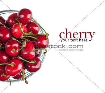 cherries in a glass bowl isolated on white background. close-up