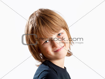 Portrait of a Cute Boy with Blond Hair Smiling 