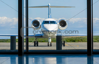 Private Corporate Jet Airplane at an Airport