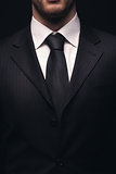 closeup of young businessman suit
