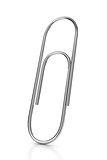 Metal paper clip on white