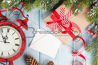 Christmas greeting card over wooden background
