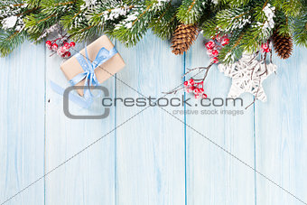 Christmas background with fir tree and gift