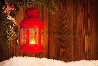 Christmas candle lantern on fir tree