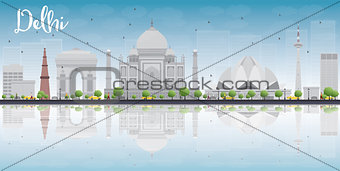Delhi skyline with grey landmarks, blue sky and reflections